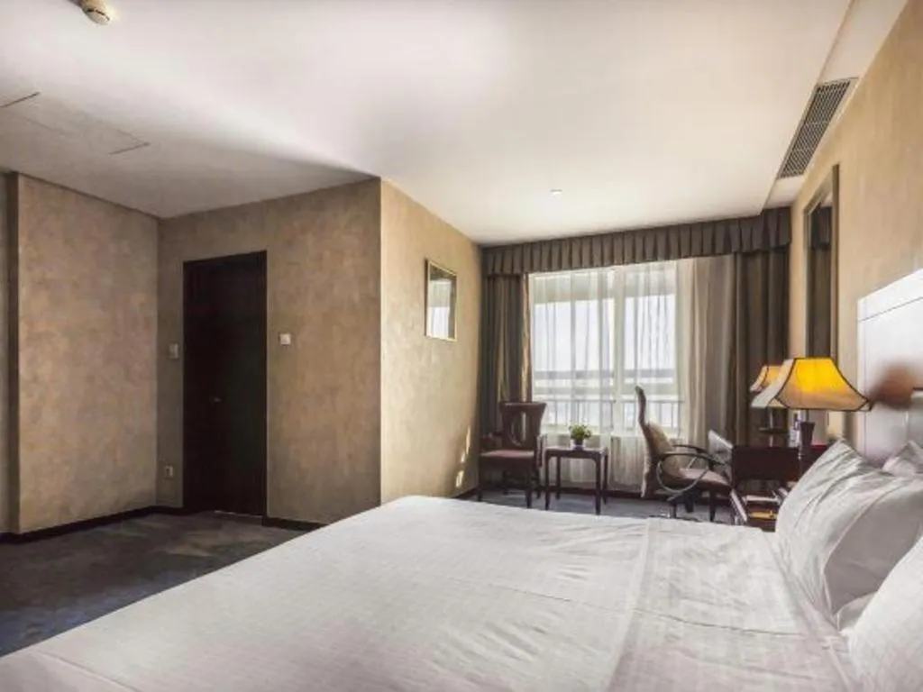 Bed in Zhong Yi Peng Ao Hotel