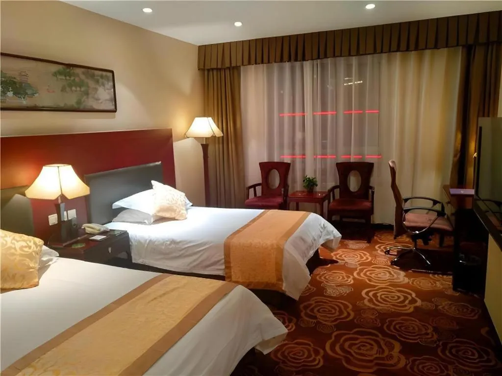 Bed in Zhong Yi Peng Ao Hotel
