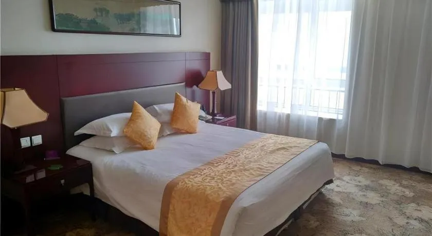 Bed in Zhong Yi Peng Ao Hotel