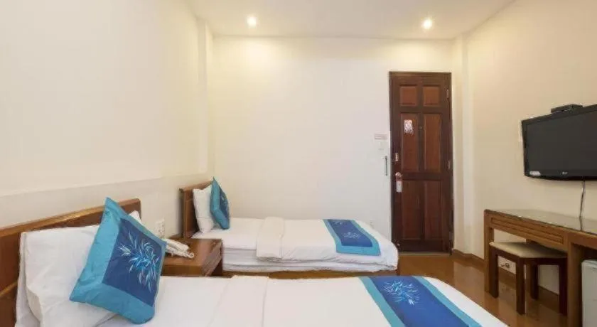 Bed in Blue River Hotel