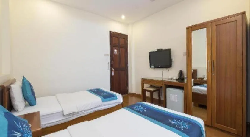 Bed in Blue River Hotel