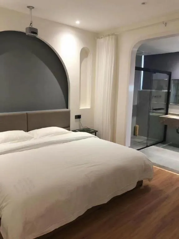 Bed in Silver Art Hotel