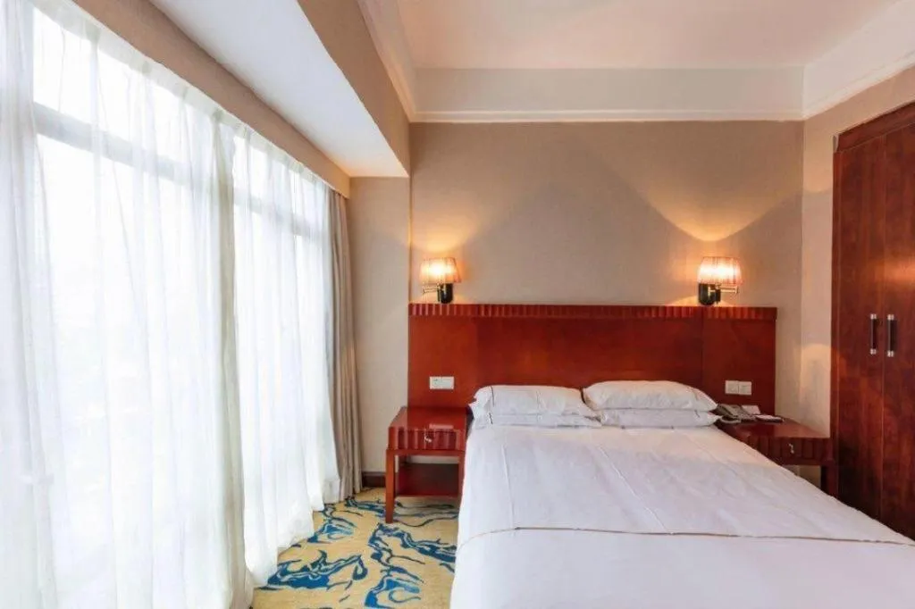 Bed in Silver Art Hotel