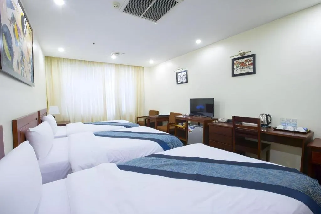 Bed in Vientiane Plaza Hotel