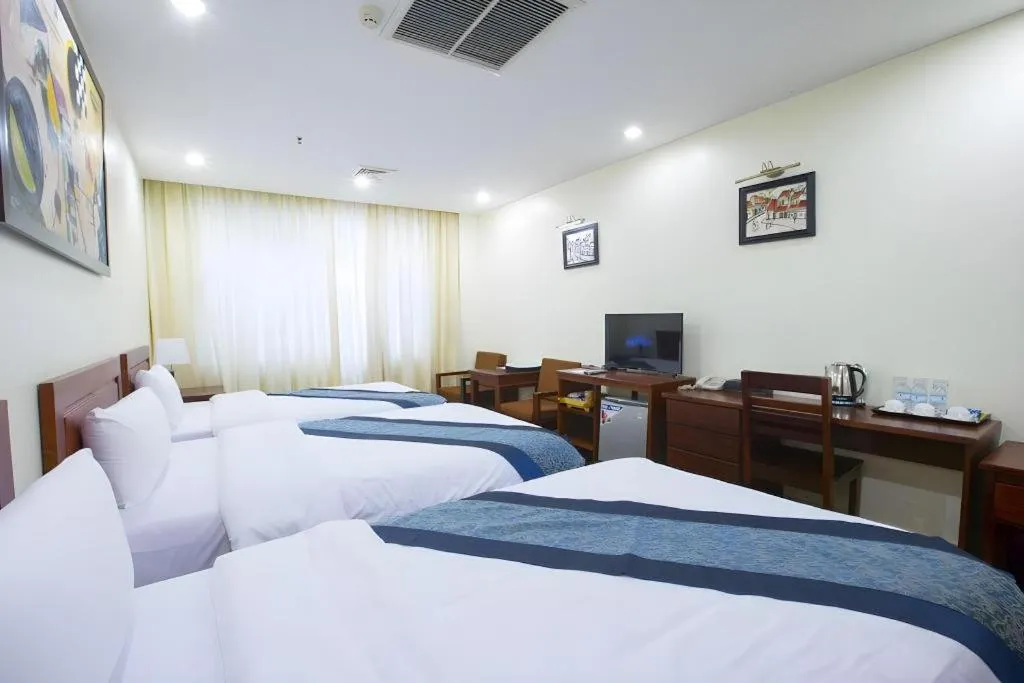 Bed in Vientiane Plaza Hotel