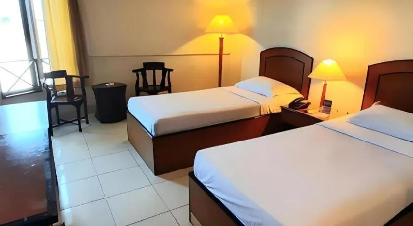 Bed in Alexander Hotel Tegal