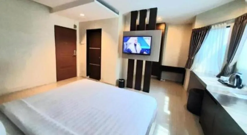 Bed in Alexander Hotel Tegal