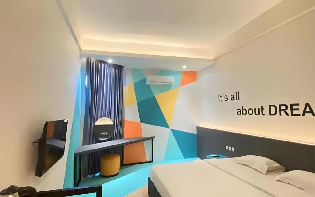 Bed in Alexander Hotel Tegal