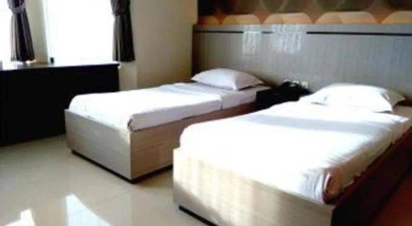 Bed in Alexander Hotel Tegal