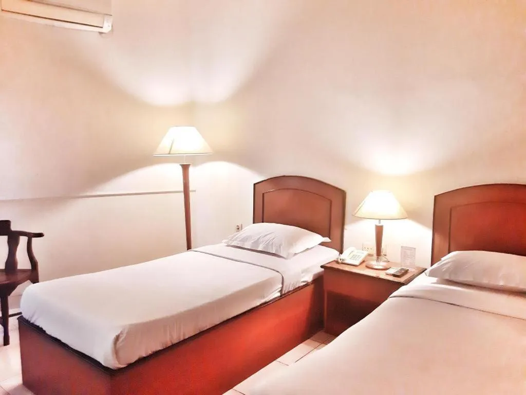 Bed in Alexander Hotel Tegal