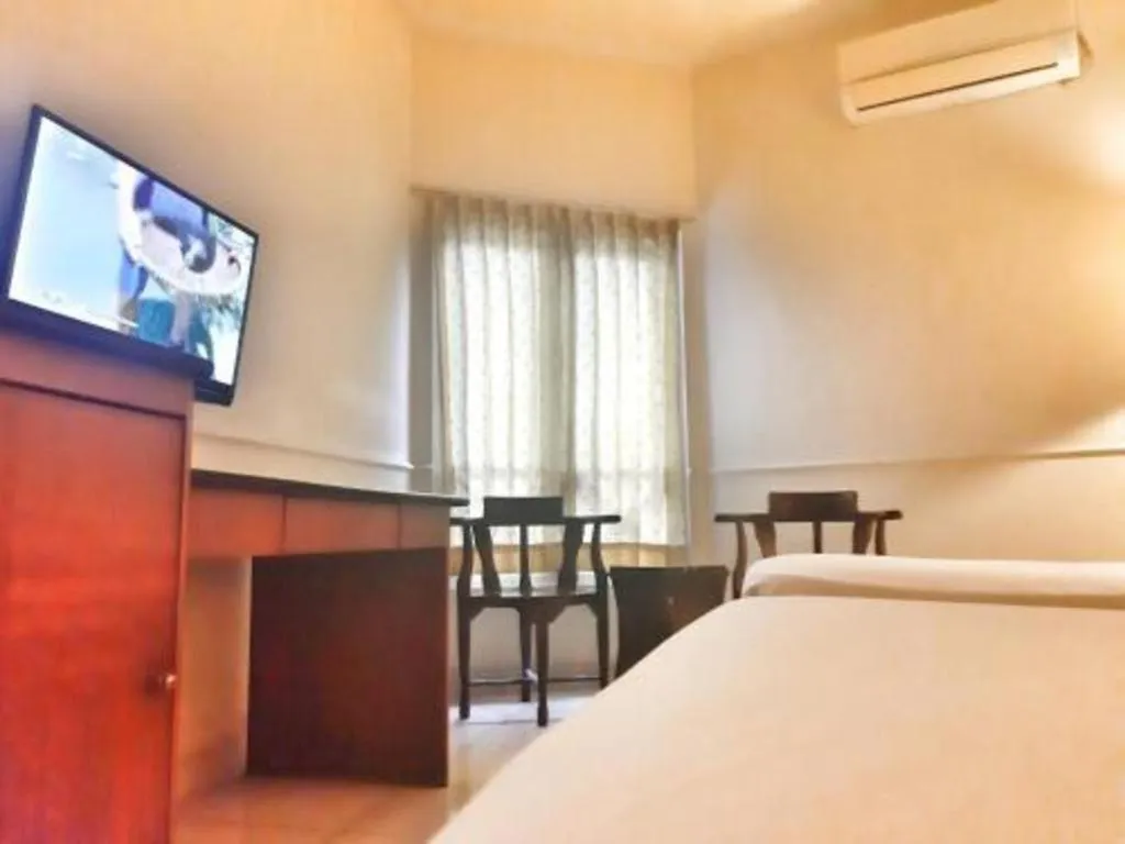 Bed in Alexander Hotel Tegal