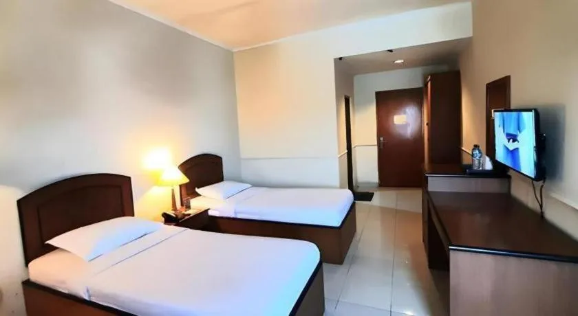 Bed in Alexander Hotel Tegal