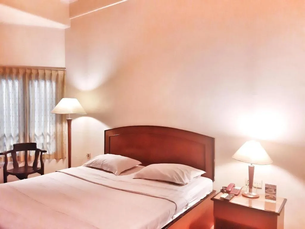 Bed in Alexander Hotel Tegal