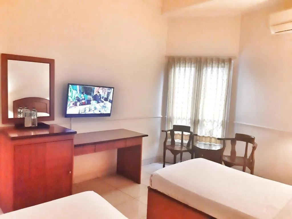 Bed in Alexander Hotel Tegal