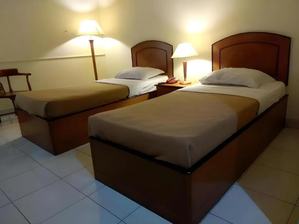 Bed in Alexander Hotel Tegal