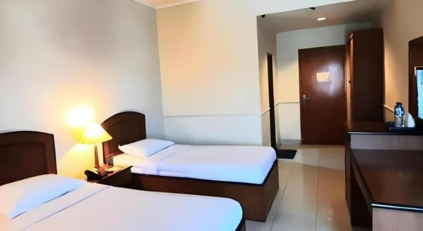 Bed in Alexander Hotel Tegal