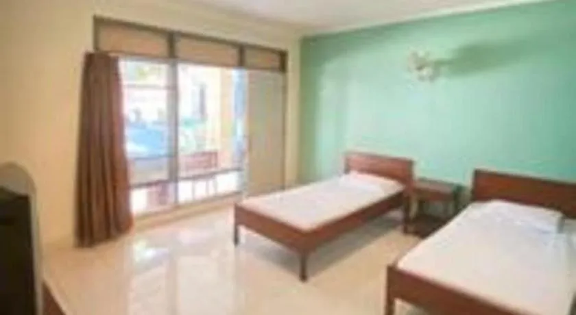 Bed in Alexander Hotel Tegal