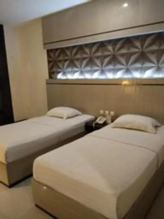 Bed in Alexander Hotel Tegal