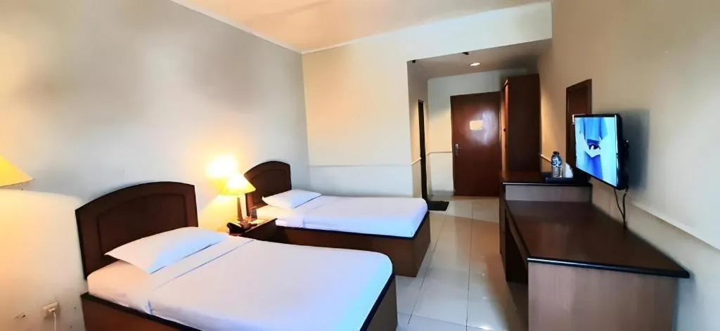 Bed in Alexander Hotel Tegal