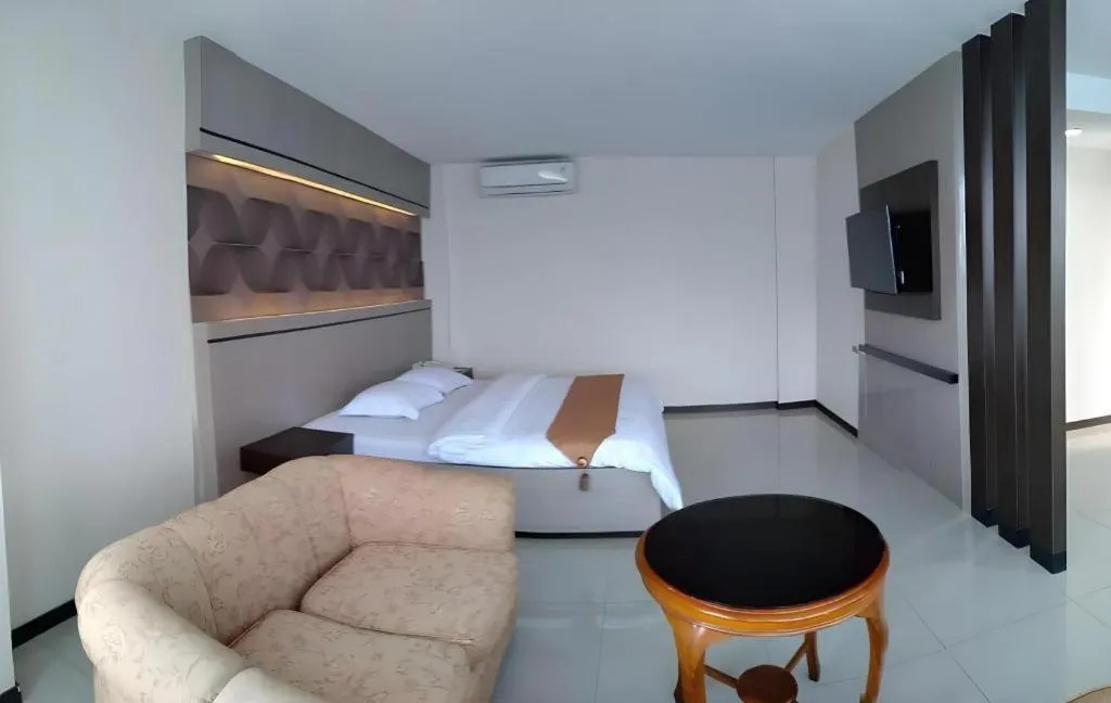 Bed in Alexander Hotel Tegal