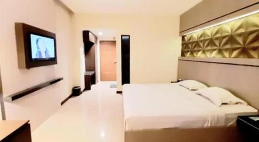Bed in Alexander Hotel Tegal