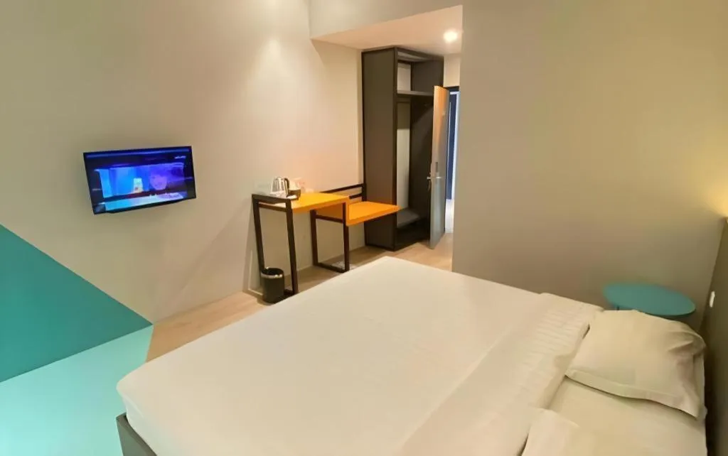 Bed in Alexander Hotel Tegal