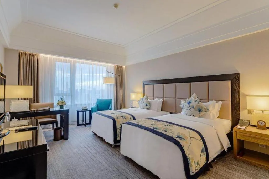 Bed in Shenyang Haiyun Jinjiang International Hotel
