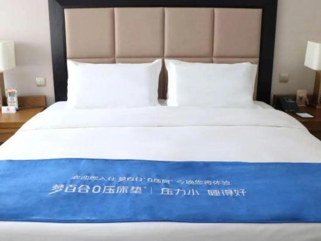 Bed in Shenyang Haiyun Jinjiang International Hotel