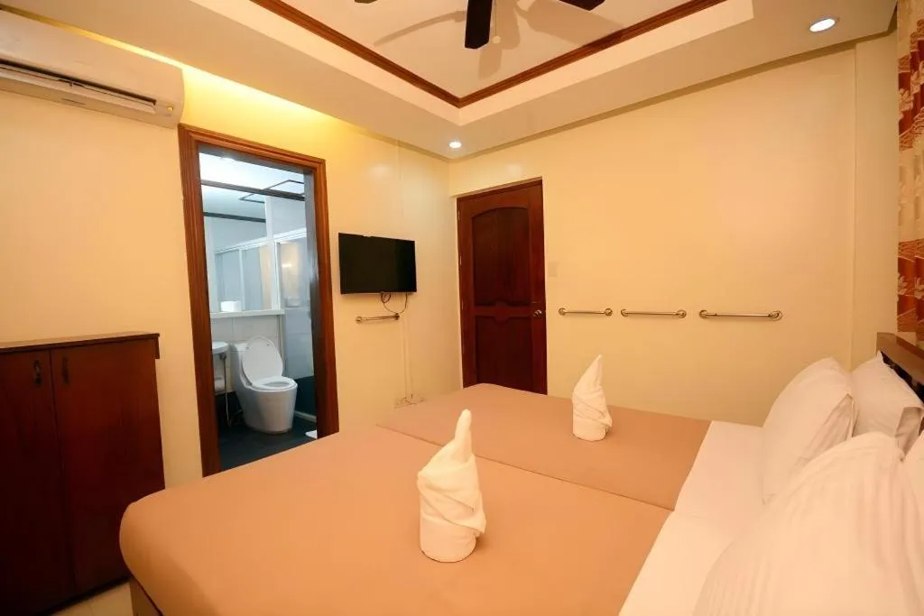 Bed in Ipil Suites El Nido