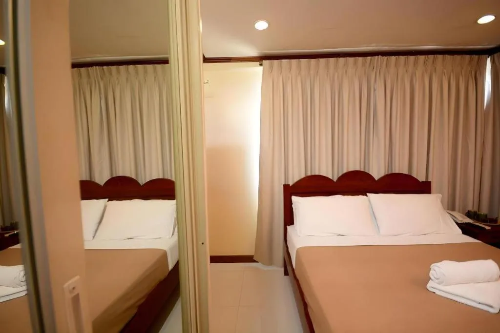 Bed in Ipil Suites El Nido