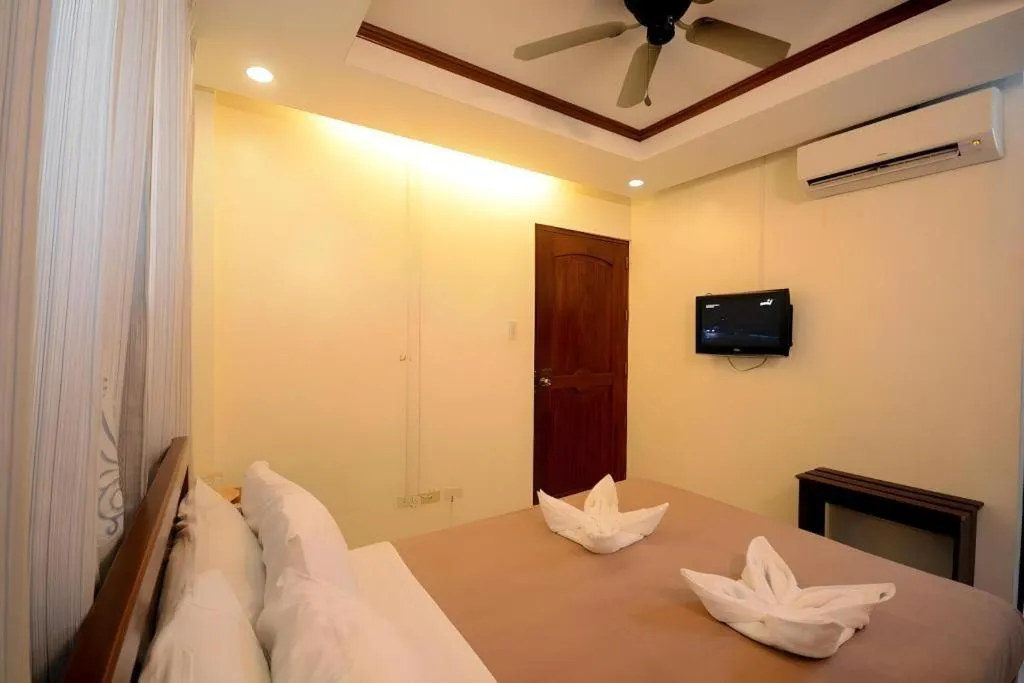 Bed in Ipil Suites El Nido