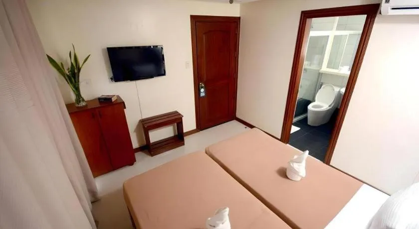 Bed in Ipil Suites El Nido