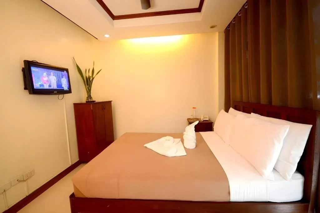 Bed in Ipil Suites El Nido