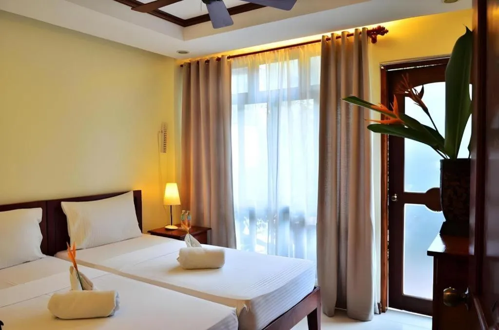 Bed in Ipil Suites El Nido