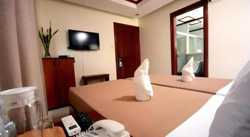 Bed in Ipil Suites El Nido