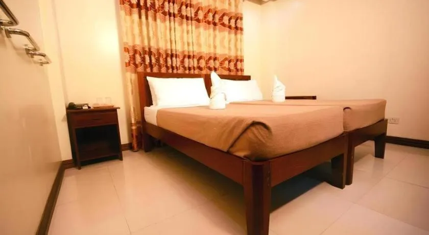 Bed in Ipil Suites El Nido