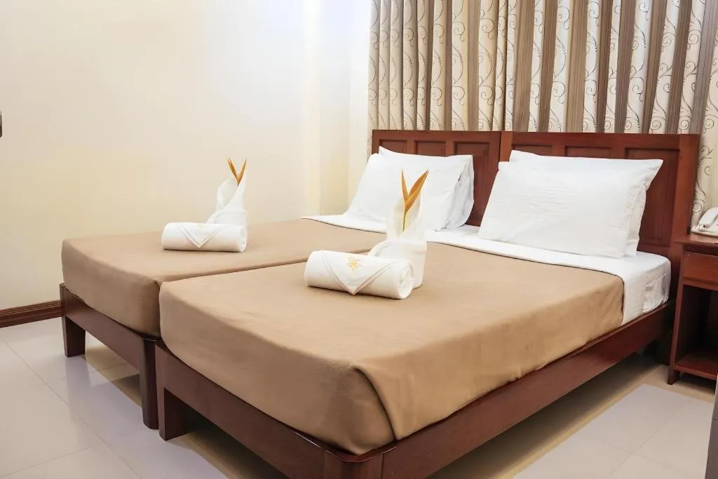 Bed in Ipil Suites El Nido