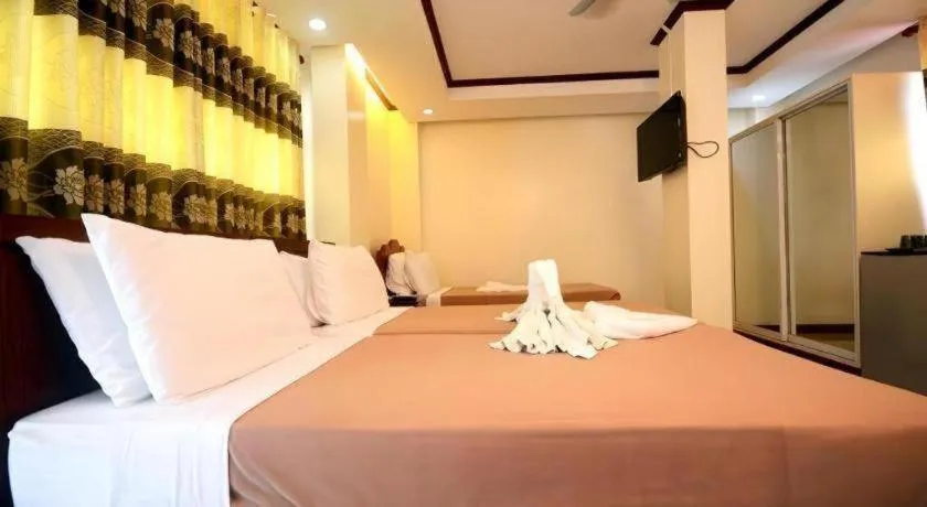 Bed in Ipil Suites El Nido