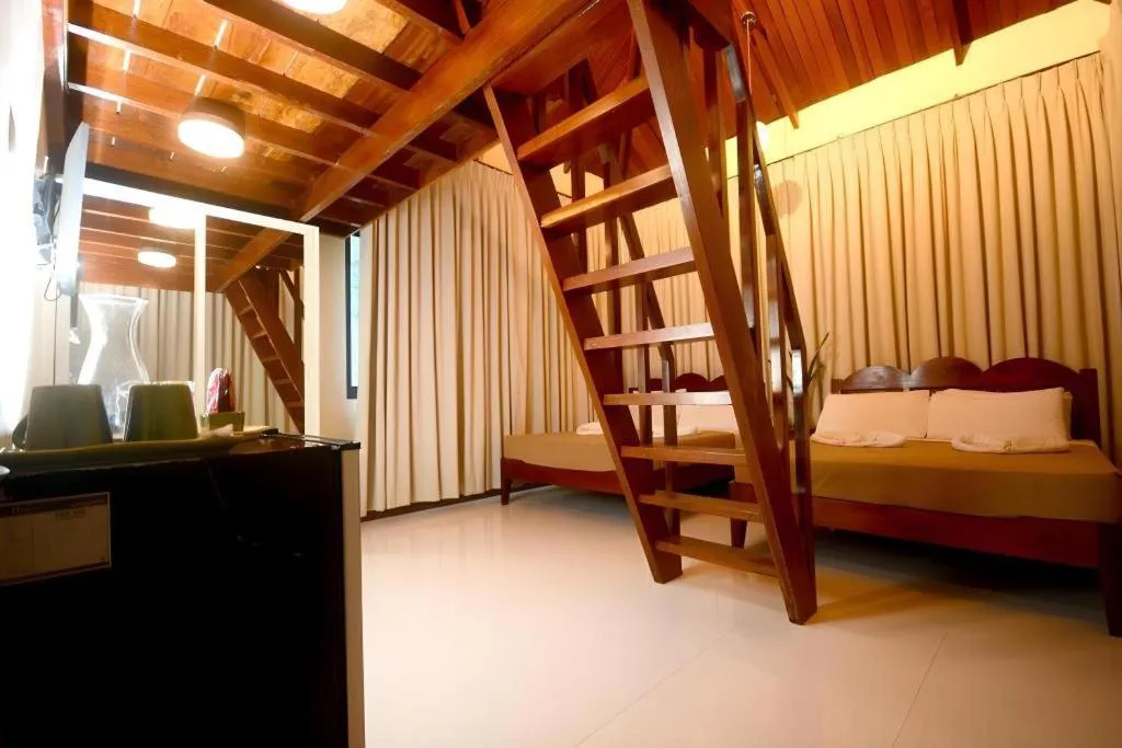 Bed in Ipil Suites El Nido