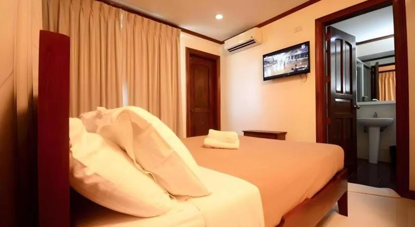 Bed in Ipil Suites El Nido