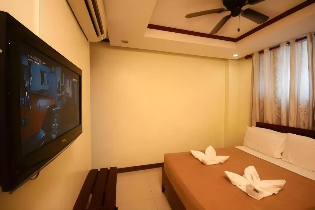 Bed in Ipil Suites El Nido