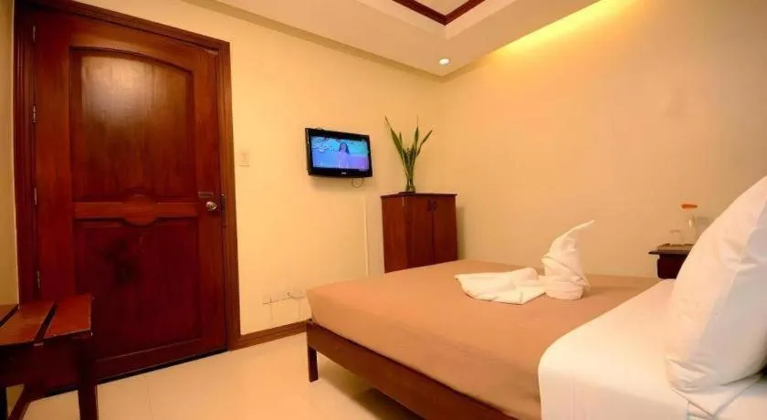 Bed in Ipil Suites El Nido