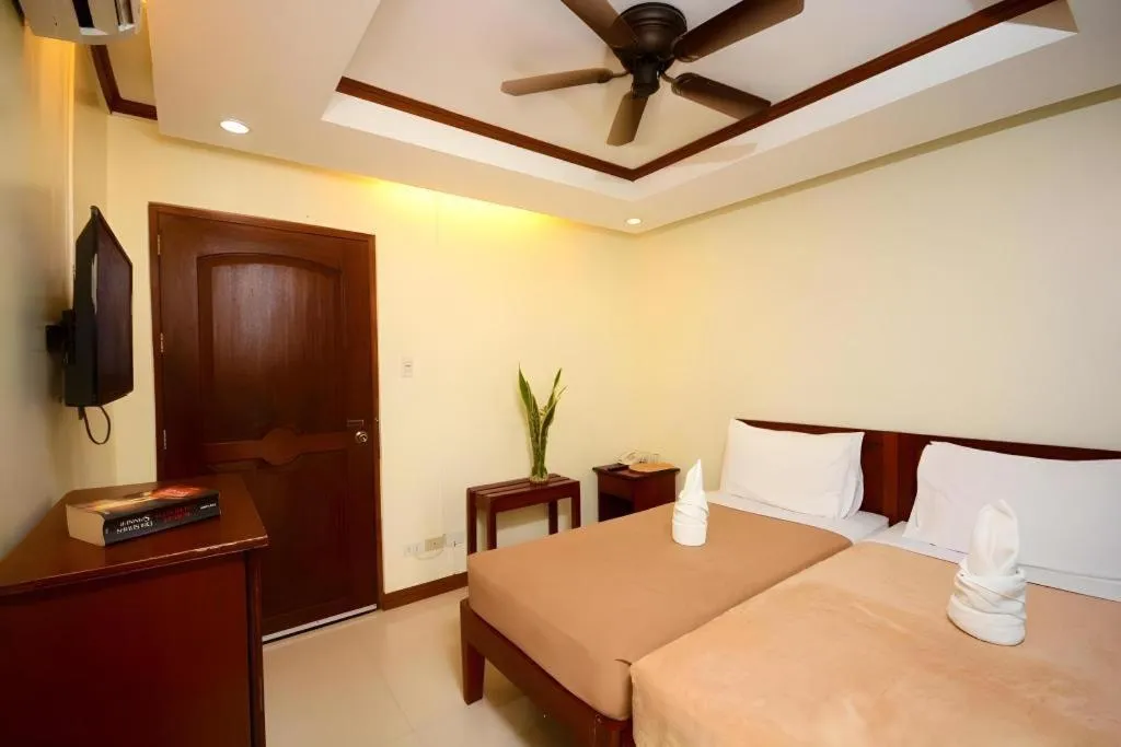 Bed in Ipil Suites El Nido