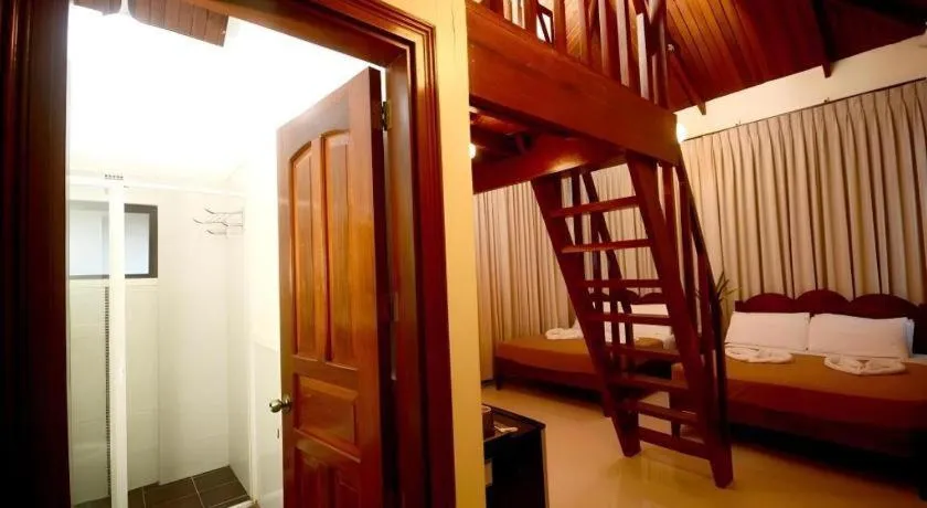 Bed in Ipil Suites El Nido