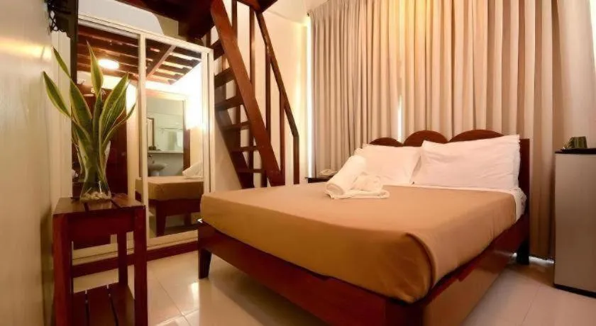 Bed in Ipil Suites El Nido