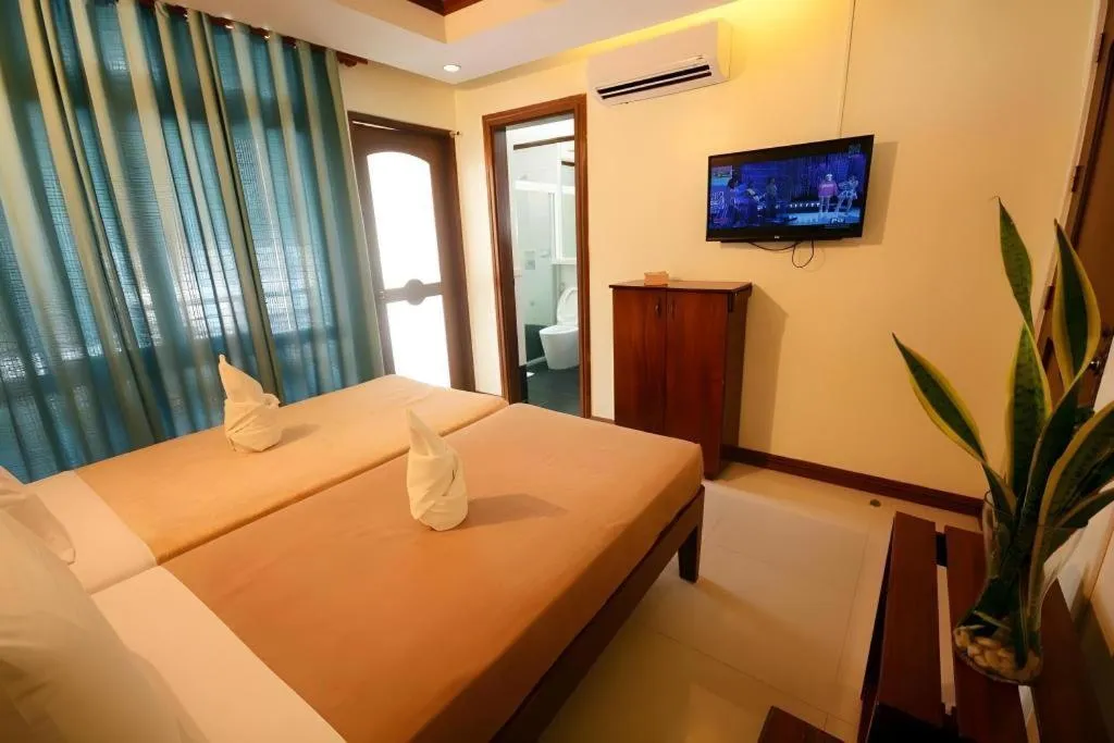 Bed in Ipil Suites El Nido