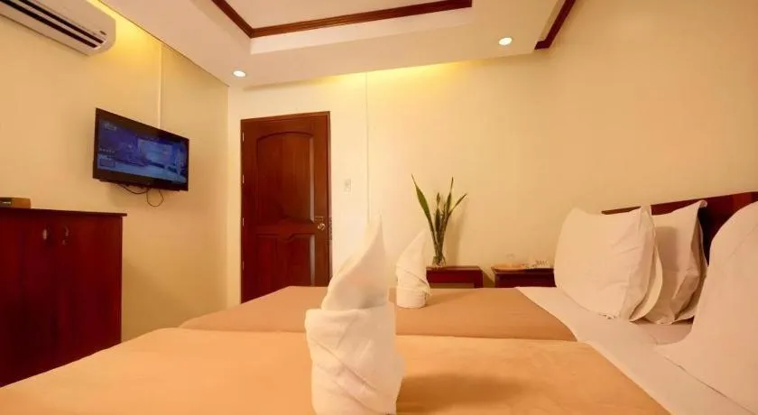 Bed in Ipil Suites El Nido