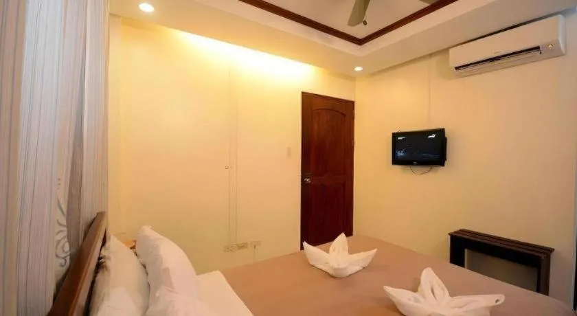 Bed in Ipil Suites El Nido