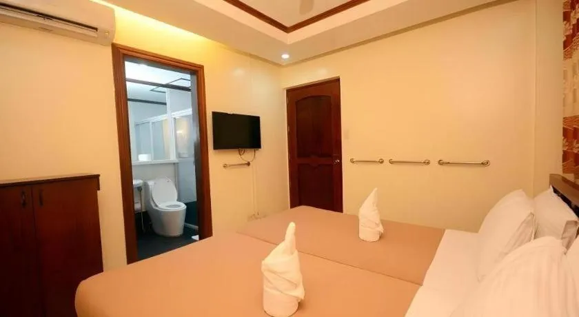 Bed in Ipil Suites El Nido