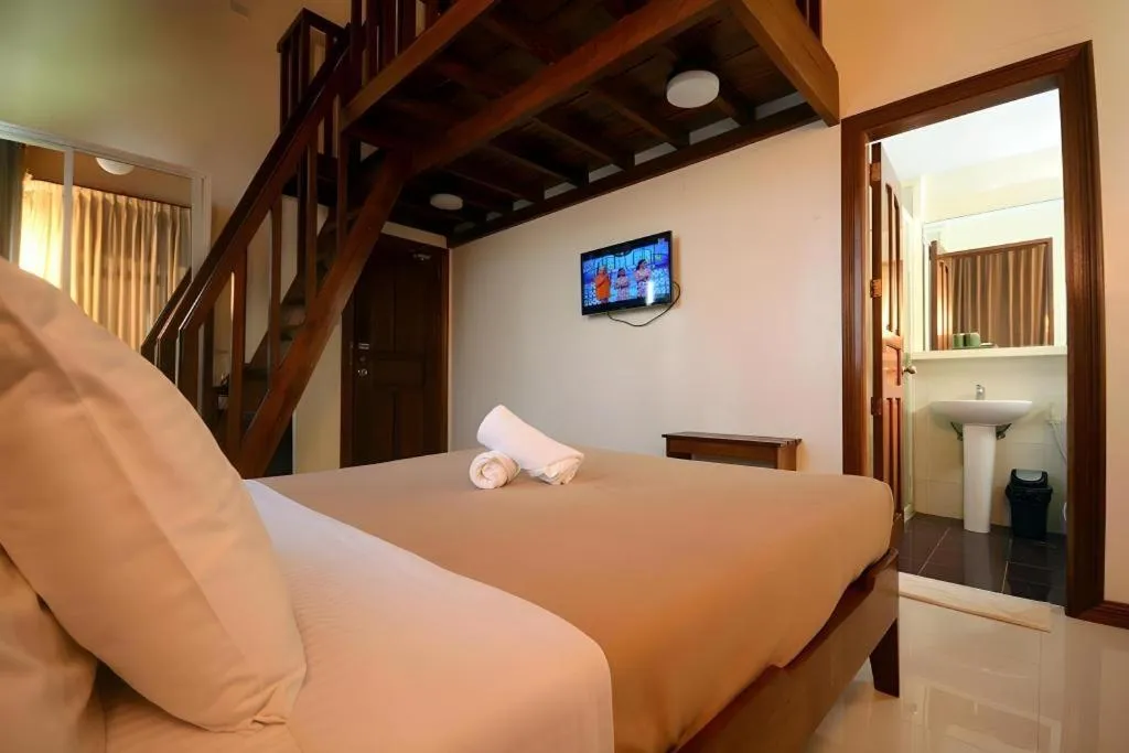 Bed in Ipil Suites El Nido